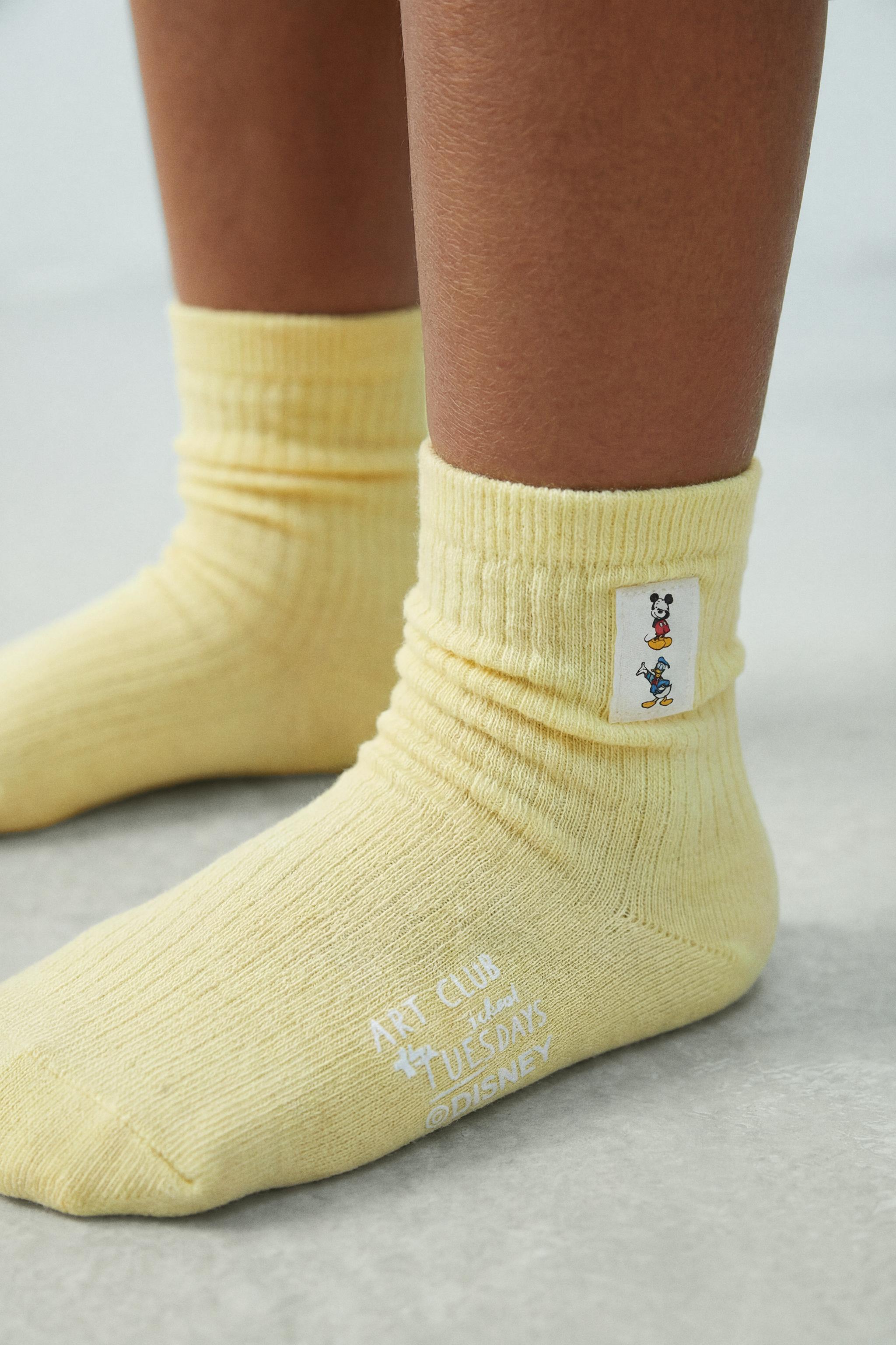 TWO-PACK OF MICKEY MOUSE AND DONALD DUCK LONG SOCKS © DISNEY